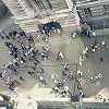 Looking down at the people in front of the ticket office