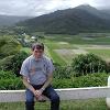 A view point, on the north side of the island, - overlooking taro fields with beautiful mountains in the distance. 