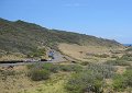 This shows the parking lot and the trail we'll be climbing up the side of the hill. - The trail winds around the hill and up the back side to the lighthouse.