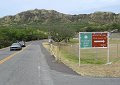 The interior of the crater has a park and a restricted government base. - We're going to climb to that peak you see ahead.