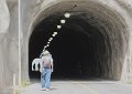 Bill heads back through the tunnel to 'The Bus'.