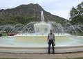 A fountain in Kapiolani Park with Diamond Head behind it.
