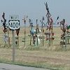 The village idiot in some small Kansas town - had erected several hundred feet of this attraction - along the side of the road.