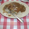 A close-up of one of the buggers.  Half devoured. - The pasties were really good at this place.