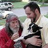 Now in Evanston near Chicago, Bill visits with Lloyd Osborn - holding their Boston terrier.
