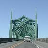 Now definitely in Oregon. - These green bridges are almost a trademark - of the Oregon coast highway.
