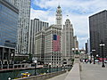 From Trump Tower, on the left, we look east along the Chicago River.  - That's the Wrigley Building with the huge flag with Tribune Tower behind it.