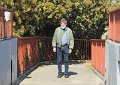Larry on the pedestrian overpass of Market Street at Romain Street just 3 blocks from home. - Even the tree behind him is flowering!