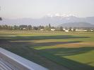 The long shadows of the setting sun and the snow covered peaks.