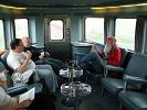 Bill is talking with John and Gaylord in the lower level lounge of the Park Car.  