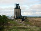 It's Thursday morning, May 24.  We've passed through all of Saskatchewan overnight and - are now in western Manitoba.  This is a grain elevator, which we see many of along the tracks.