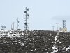 Antenna towers seen on the hill across the highway from the restaurant