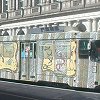 Check out the paint job on this street car. - It's almost camouflaged against the building.