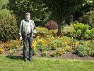 Larry with some of the flowers in the park