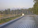 The snow covered peaks can be easily seen now