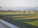 The long shadows of the setting sun and the snow covered peaks