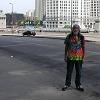 Bill stands on Wacker Drive in front of the Hyatt with the Michigan Avenue Bridge behind him.