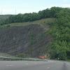 A massive cut through the rock for the highway - somewhere in eastern Pennsylvania or New York State.
