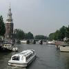 The canals are busy with tour boats and pleasure craft
