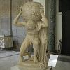 Atlas kneeling with a globe on his shoulders.  Dating from around - A.D. 150, it's the oldest existing statue of the Titan of Greek mythology - and more importantly the oldest known representation of the celestial sphere. 