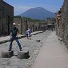 One of the streets of the city.  The stones Larry is standing on were stepping stones for - crossing over the center of the street.  During rainstorms the streets were often filled with water.