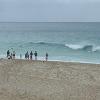 A few were out trying to catch a wave even though they weren't that large.