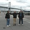 On The Embarcadero, with the Bay Bridge in the background.