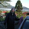 Thursday, December 19 - After spending the night in Harihari overlooking - the Tasman Sea, Bill wipes the dew off the - windshield as we prepare to leave.