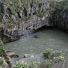 Here you see a rock bridge over the water