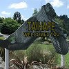 Saturday, December 21 - Larry had to stop and get this picture of a boot at the - city limits of Taihape.  They have a rubber boot factory there.