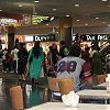 We await our flight at Auckland Airport