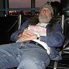 At LAX, Bill awaits our United flight to San Francisco. - He's worn out after so many hours of flying, and - he has a sunburned nose on the shortest day of the year!