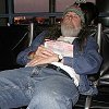 At LAX, Bill awaits our United flight to San Francisco. - He's worn out after so many hours of flying, and - he has a sunburned nose on the shortest day of the year!