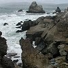 More rugged rocks and surf.