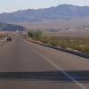 We spent the night in Barstow, California, where we met - our friend Larry Shochet who was on the way to Phoenix. - We had dinner together and then we bowled a couple of strings. - ------------- - Tuesday, October 11 - This photo was taken after we left Barstow, going - northeast on Interstate 15 approaching Baker, California.