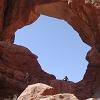 That is me, seated in the arch's opening.  It was actually quite a steep climb up there. - Larry wanted me to stand for the photo, but the ledge - I was seated on was way to skinny for that!